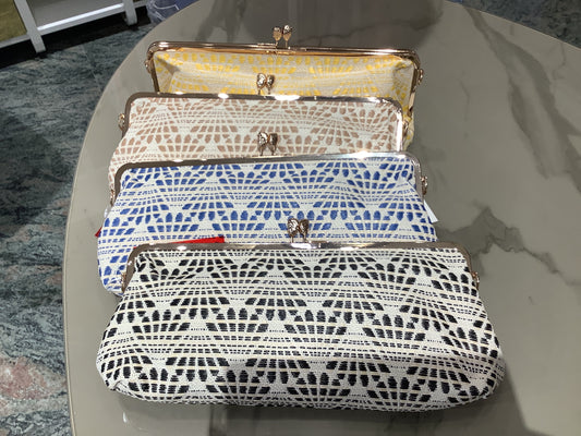 Pochette a mano e tracolla