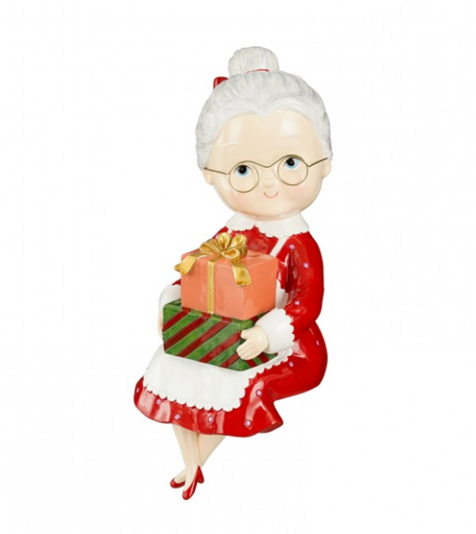 Donna seduta abito Natale